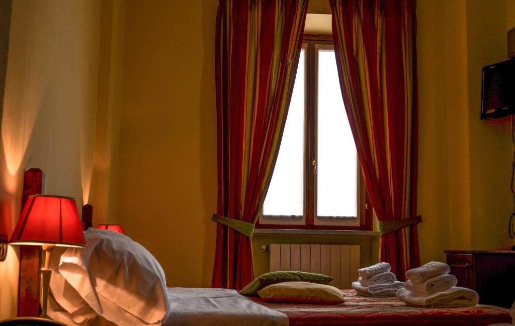 Postel nebo postele na pokoji v ubytování Hotel Oberje Dla Viere