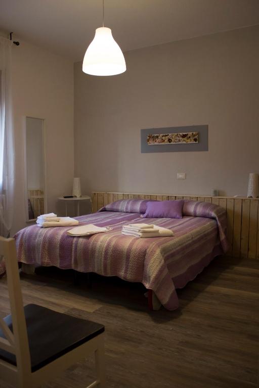 Postel nebo postele na pokoji v ubytování Albergo Felice