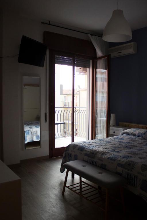 Postel nebo postele na pokoji v ubytování Albergo Felice