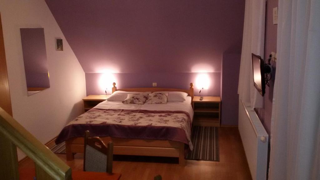 Posteľ alebo postele v izbe v ubytovaní Guest House Wolf