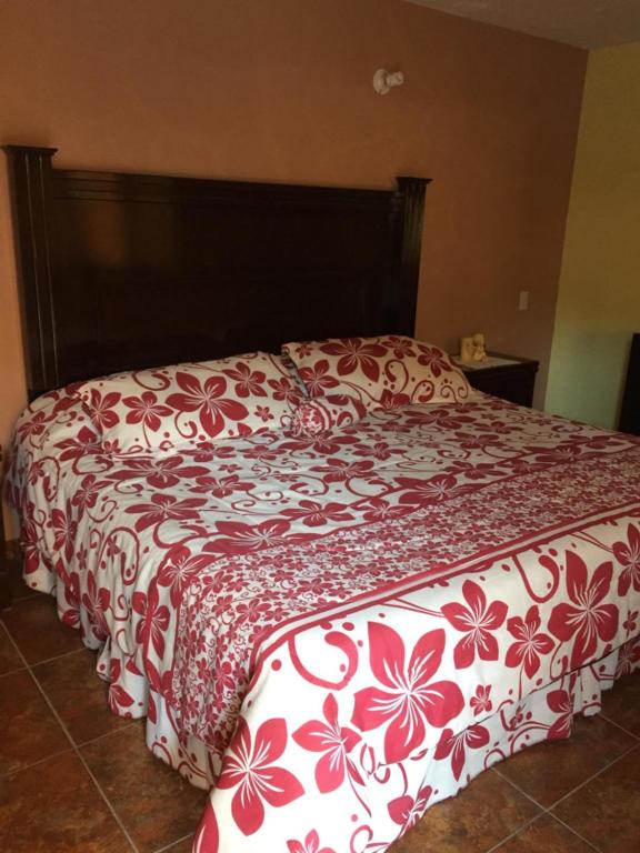 Postel nebo postele na pokoji v ubytování Posada Quinta Alejandra