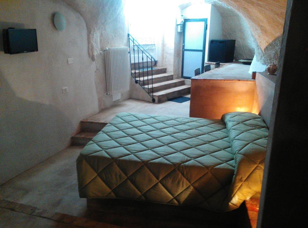 Telewizja i/lub zestaw kina domowego w obiekcie Stone Rooms