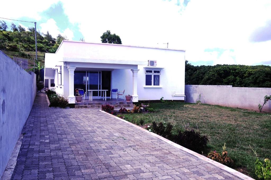 Zahrada ubytování Le Paradisier Guest House