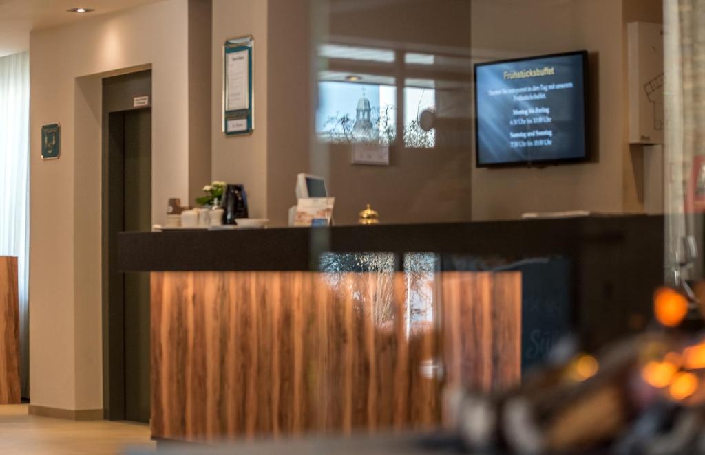 TV a/nebo společenská místnost v ubytování Akzent Hotel Köhler