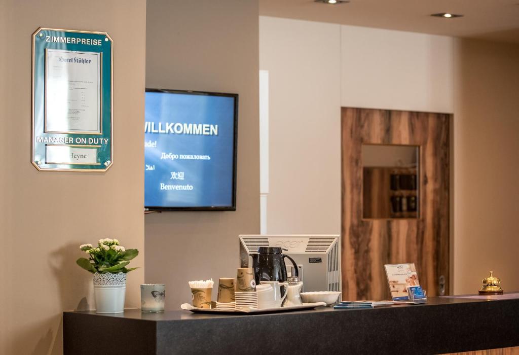Příslušenství pro přípravu čaje a kávy v ubytování Akzent Hotel Köhler