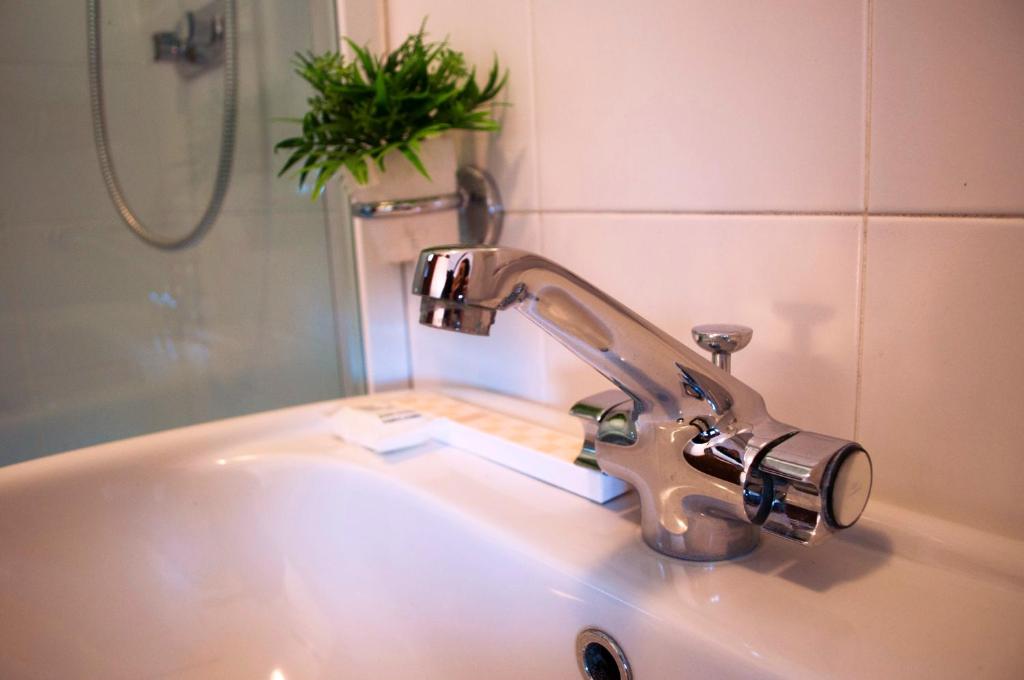 Koupelna v ubytování Boutique Hotel Corte Malaspina