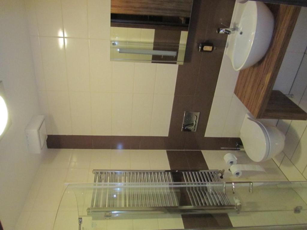 Koupelna v ubytování Hotel Opara