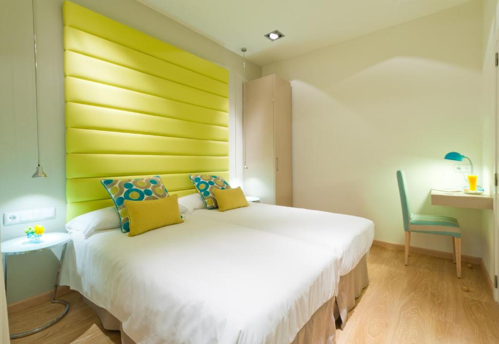 Postel nebo postele na pokoji v ubytování BacHome Terrace B&B