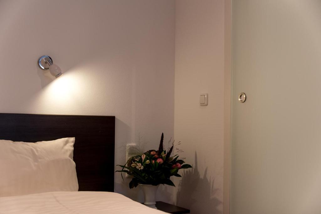 Postel nebo postele na pokoji v ubytování Hotel Fürstenhof