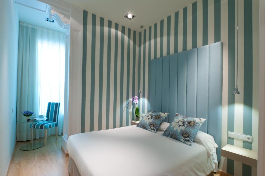 Postel nebo postele na pokoji v ubytování BacHome Terrace B&B
