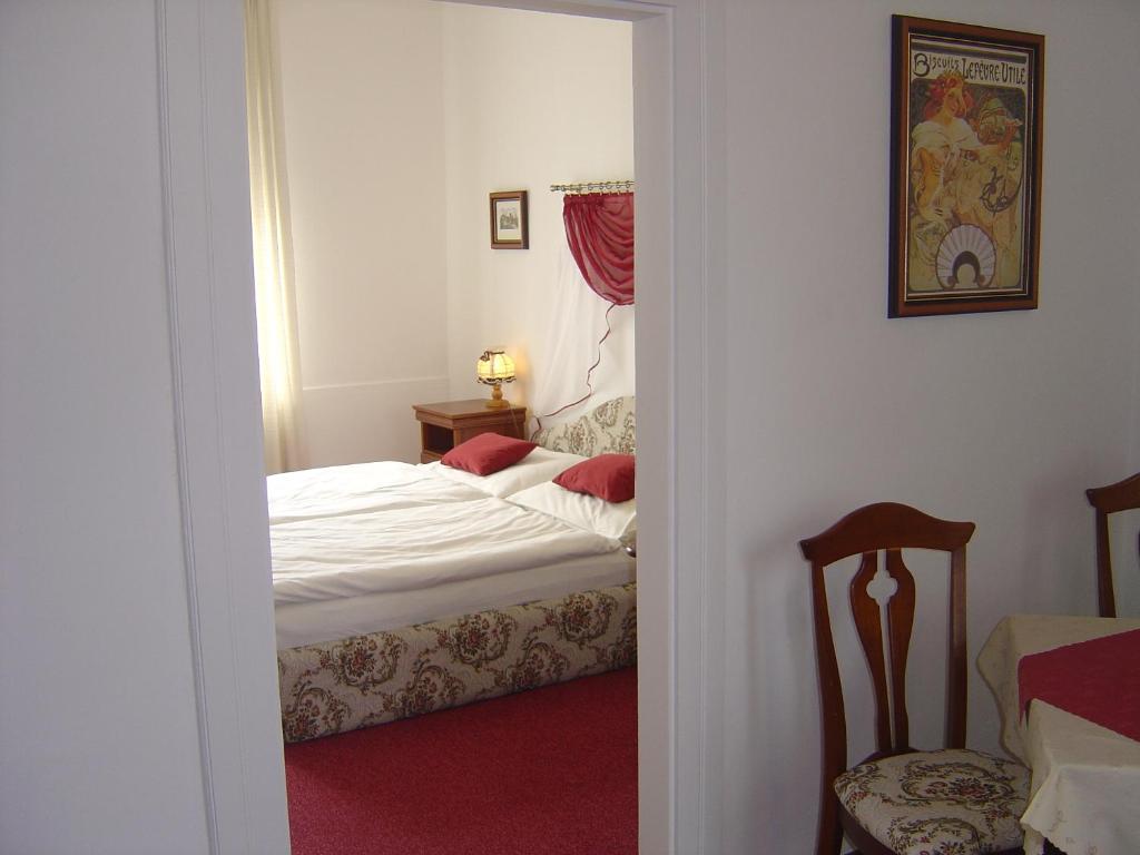 Postel nebo postele na pokoji v ubytování Hotel Excellent