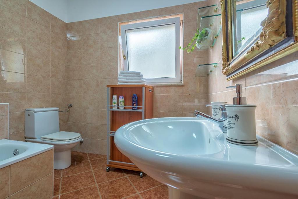 Koupelna v ubytování Apartment Majoran