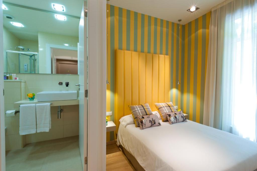 Postel nebo postele na pokoji v ubytování BacHome Terrace B&B