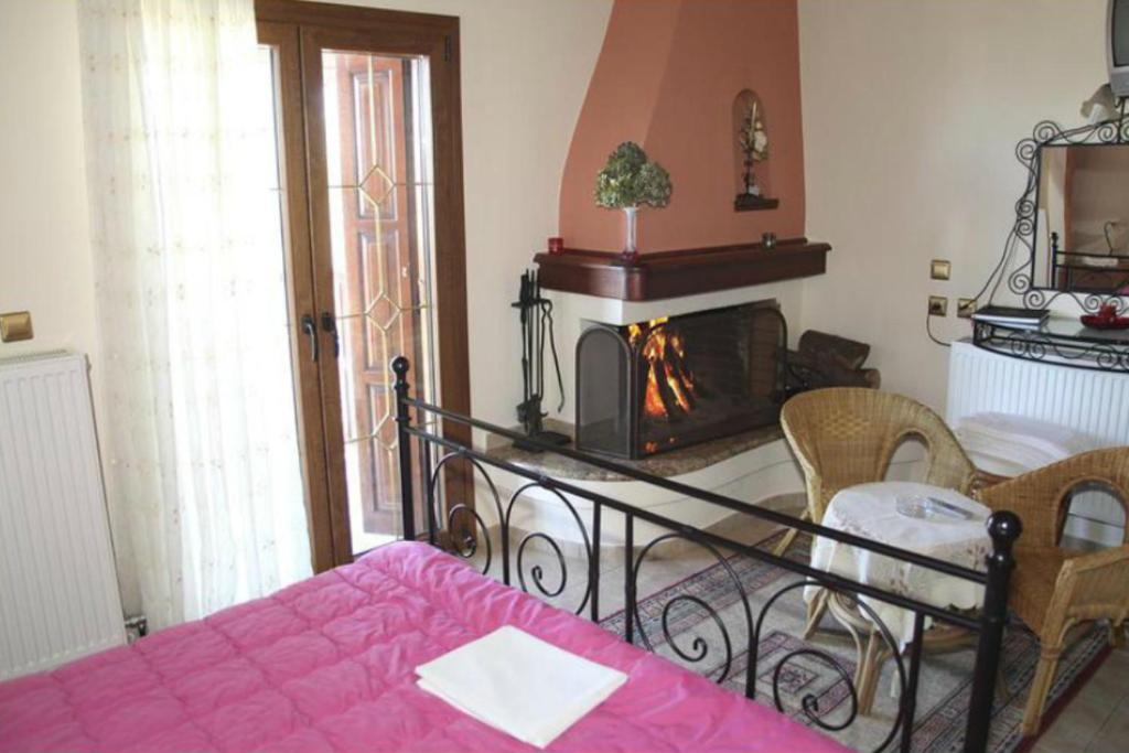 Postel nebo postele na pokoji v ubytování Guesthouse Xenioti