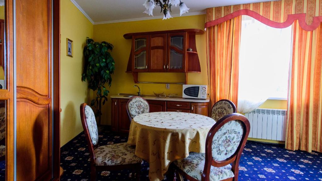 TV a/nebo společenská místnost v ubytování Hotel Premyer