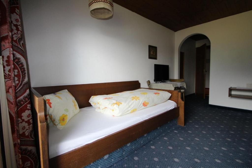 Łóżko lub łóżka w pokoju w obiekcie Pension Christoph