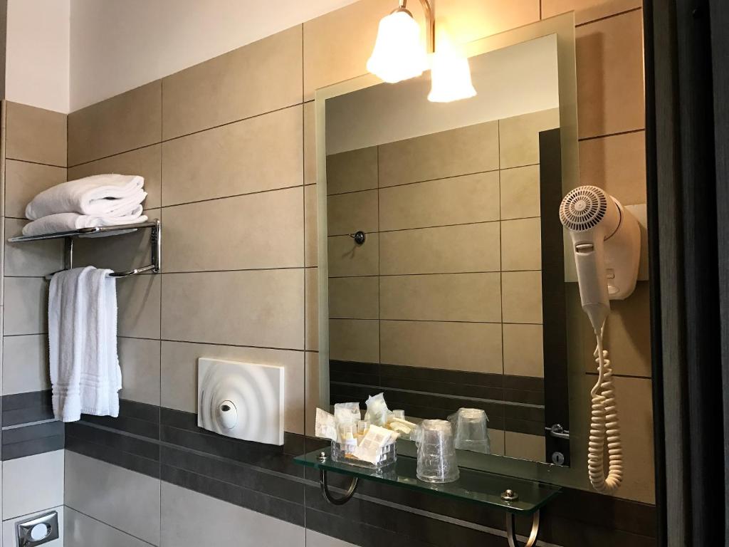 Koupelna v ubytování Hotel Visagi