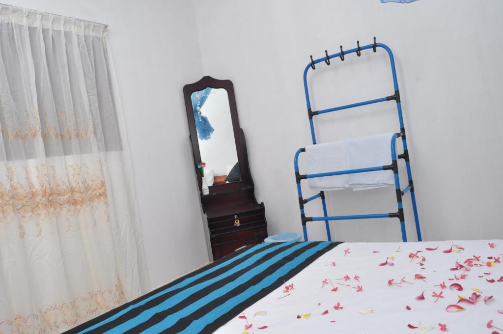 Postel nebo postele na pokoji v ubytování TMS Beach House