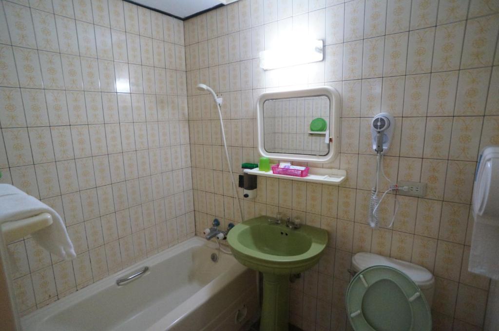 Koupelna v ubytování Yi Yuan Hotel