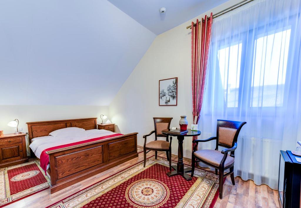 Postel nebo postele na pokoji v ubytování Karlhof