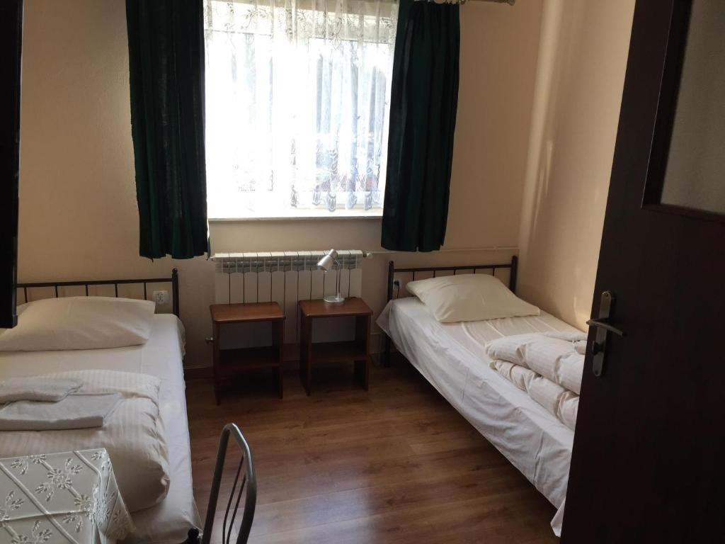 Łóżko lub łóżka w pokoju w obiekcie Motel u Olka Boczów