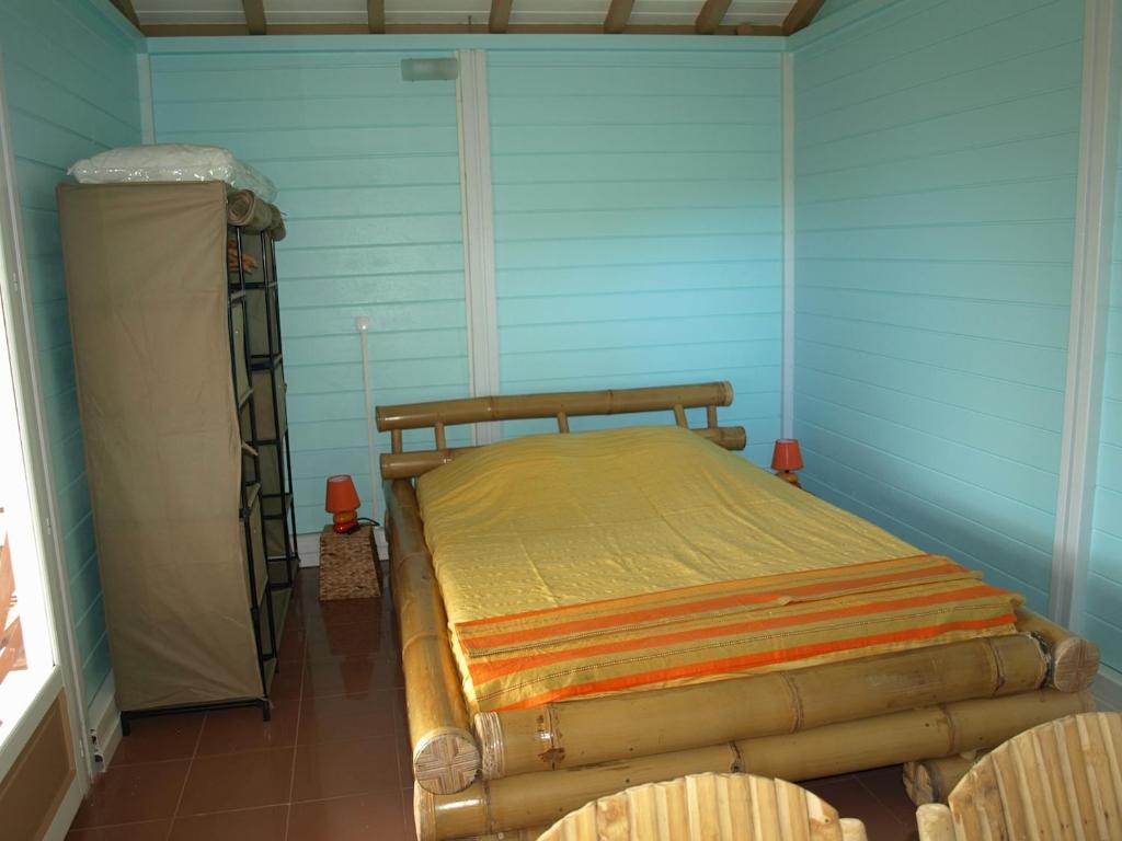 Postel nebo postele na pokoji v ubytování Coco D'Iles