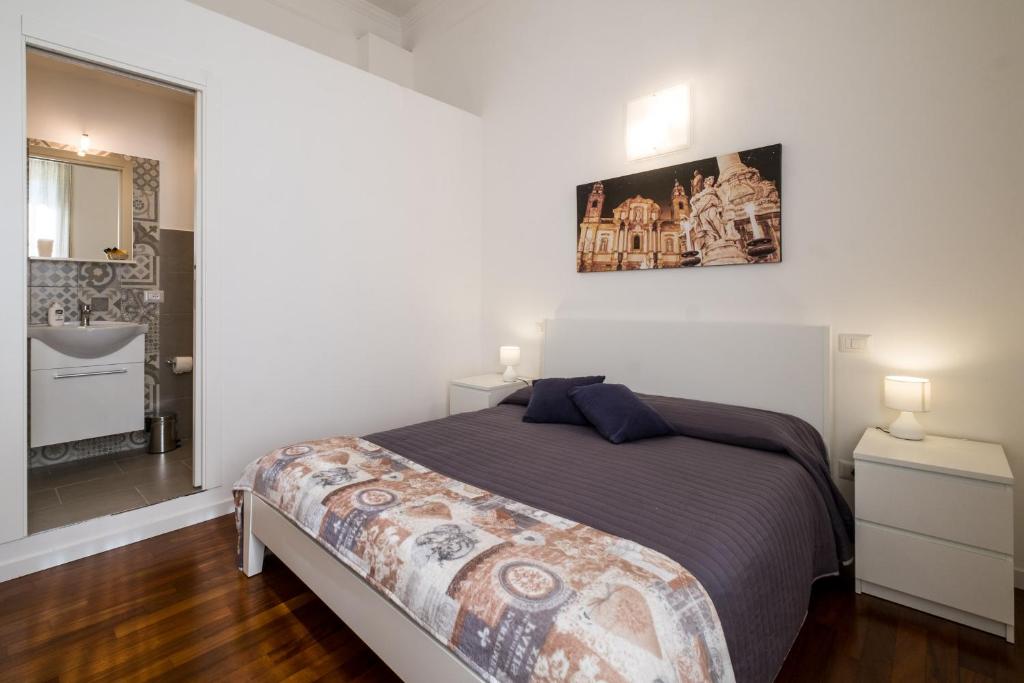 Postel nebo postele na pokoji v ubytování Ai Lattarini House