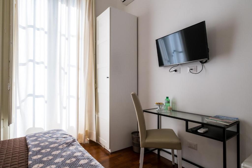 TV a/nebo společenská místnost v ubytování Ai Lattarini House