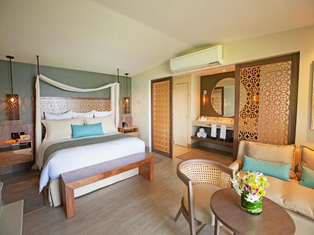 Voodi või voodid majutusasutuse Secrets Papagayo All Inclusive - Adults Only toas
