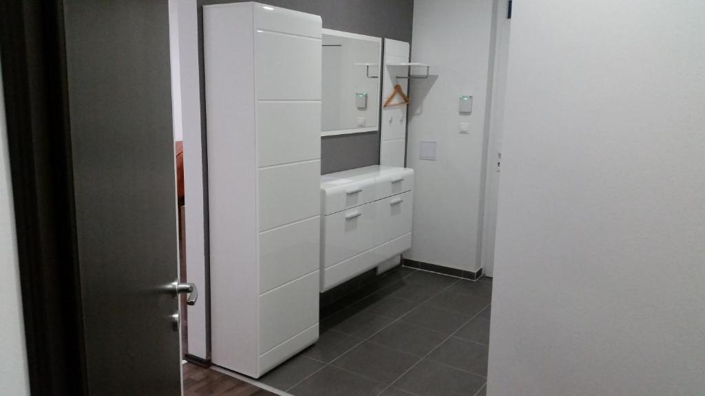 Kuchyň nebo kuchyňský kout v ubytování Apartment J&D