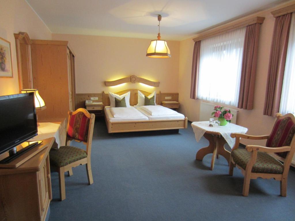 Postel nebo postele na pokoji v ubytování Hotel Plainbrücke | self check-in