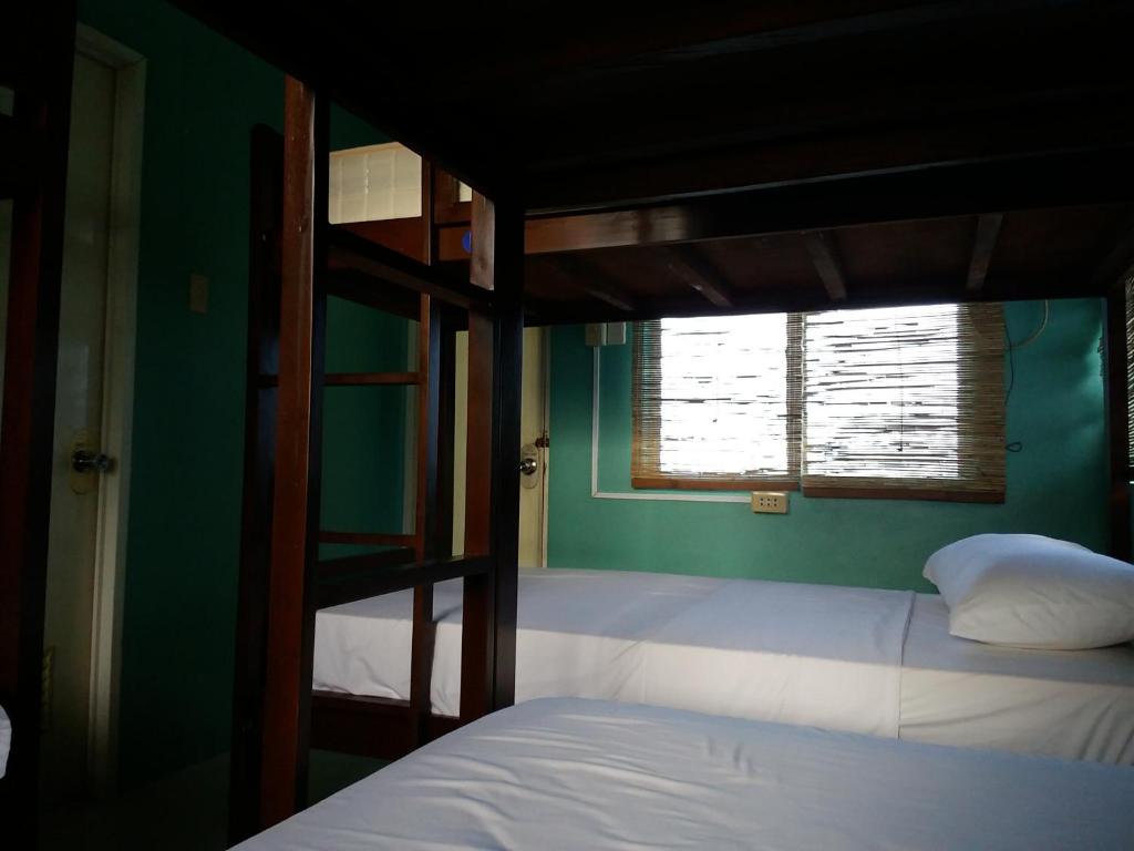 Postel nebo postele na pokoji v ubytování My Hostel Boracay