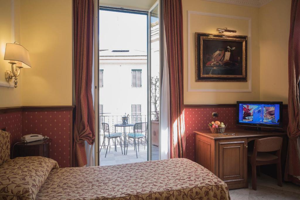 TV a/nebo společenská místnost v ubytování Hotel Donatello
