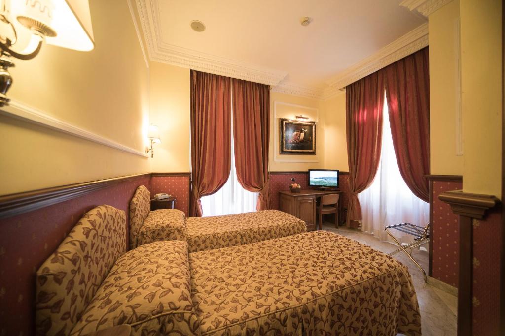 TV a/nebo společenská místnost v ubytování Hotel Donatello