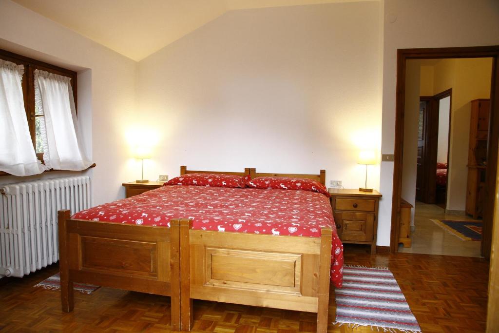 Postel nebo postele na pokoji v ubytování Chalet dell'Ermellino