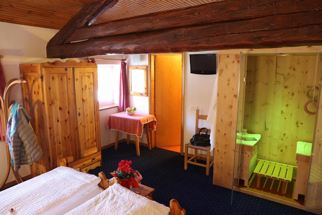 Postel nebo postele na pokoji v ubytování Albergo Due Spade