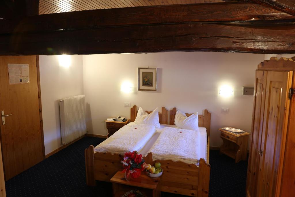Postel nebo postele na pokoji v ubytování Albergo Due Spade