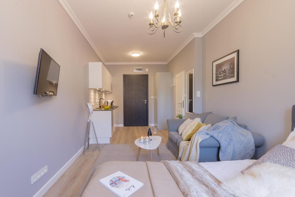 Posteľ alebo postele v izbe v ubytovaní VIU Velvet Apartment