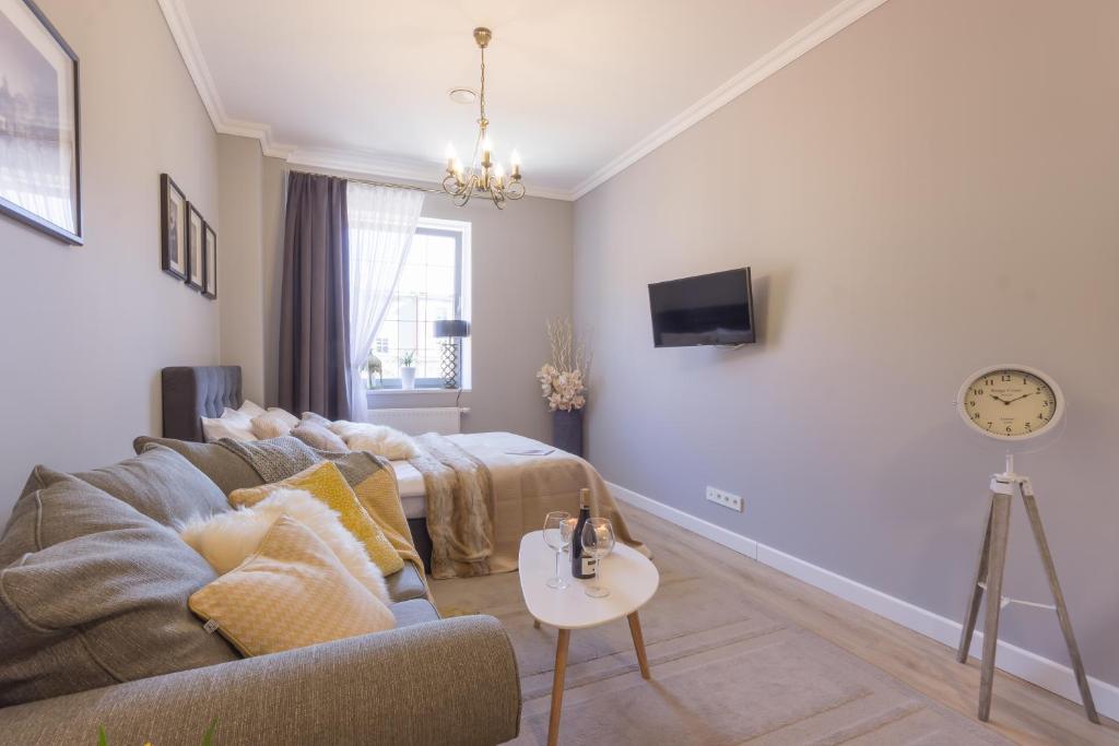 Televízia a/alebo spoločenská miestnosť v ubytovaní VIU Velvet Apartment