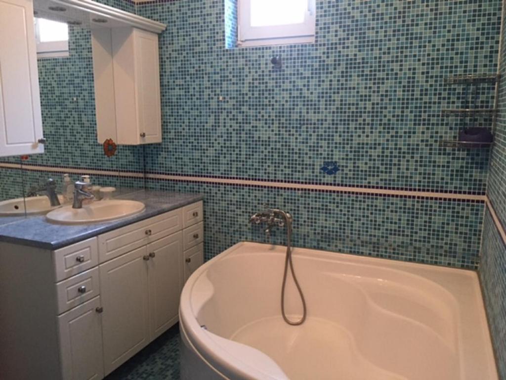 Łazienka w obiekcie Imre Apartman