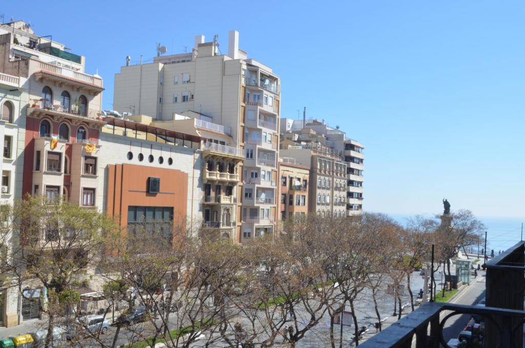 a view of a city with tall buildings at ApartSuits Tarragona Rambla Nova 24 in Tarragona