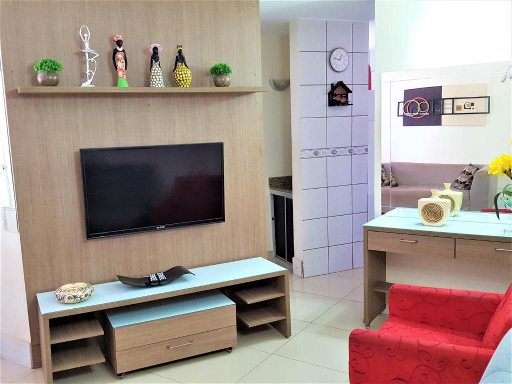 TV a/nebo společenská místnost v ubytování Apart Cote D'Azur Maceió