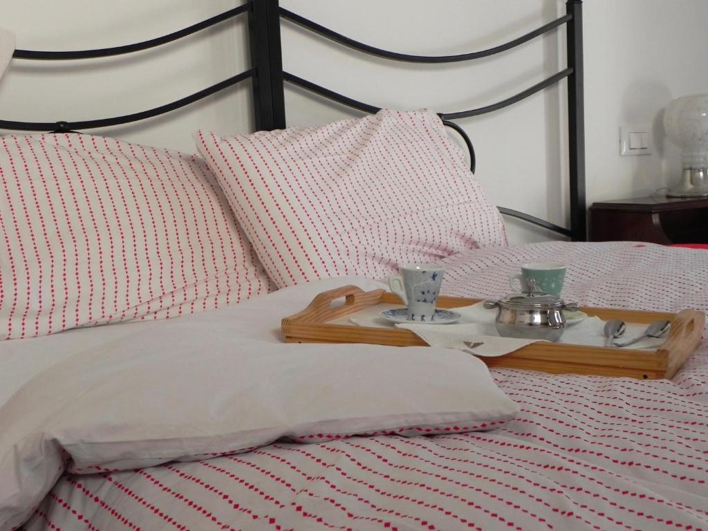 A bed or beds in a room at Villa Carlotta