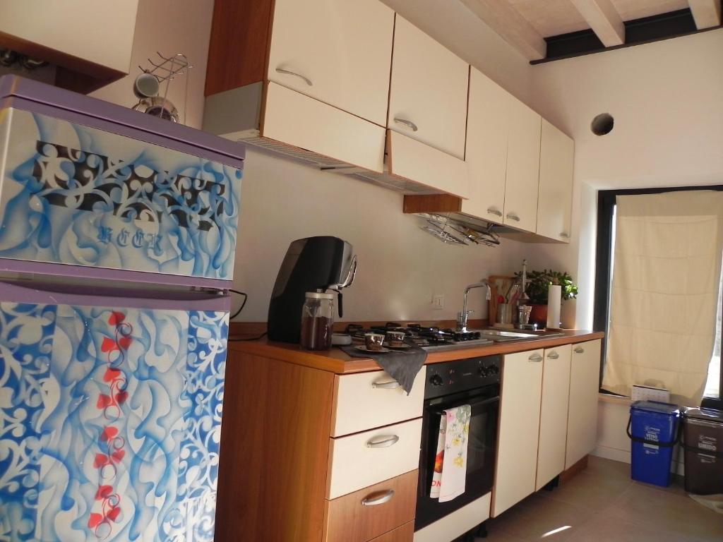 A kitchen or kitchenette at Villa Carlotta