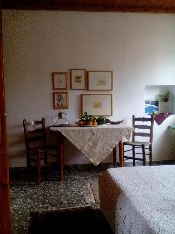 Postel nebo postele na pokoji v ubytování Nightingale Cottage Pelion