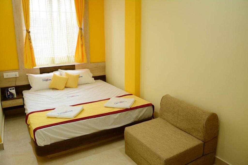 Postel nebo postele na pokoji v ubytování Hotel Landmark