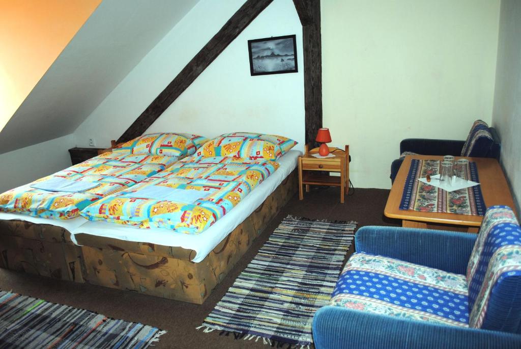 Postel nebo postele na pokoji v ubytování Penzión Slávia