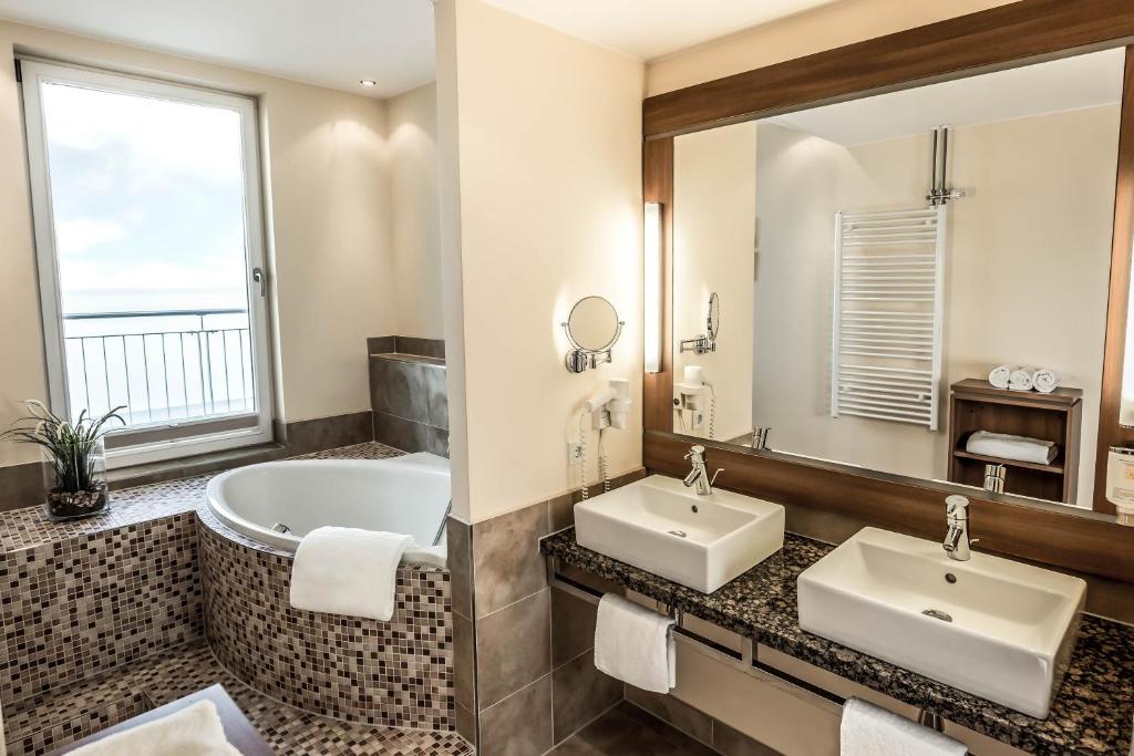 Ein Badezimmer in der Unterkunft Seehotel Fleesensee
