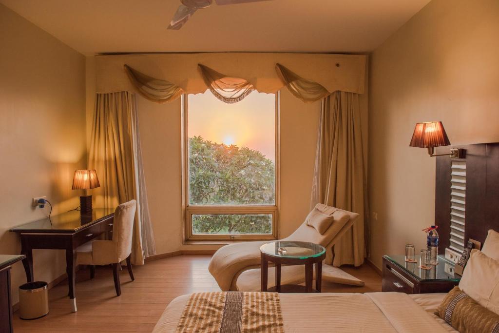 Posezení v ubytování The Red Maple Mashal