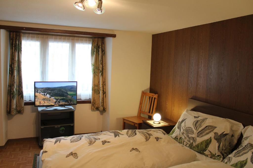 Postel nebo postele na pokoji v ubytování Chalet Alpentraum, alte Gasse 20